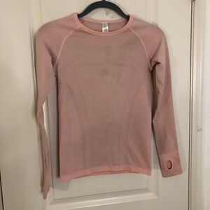 Size small Ivivva long sleeve, pink top with thumb holes lightweight layering 12